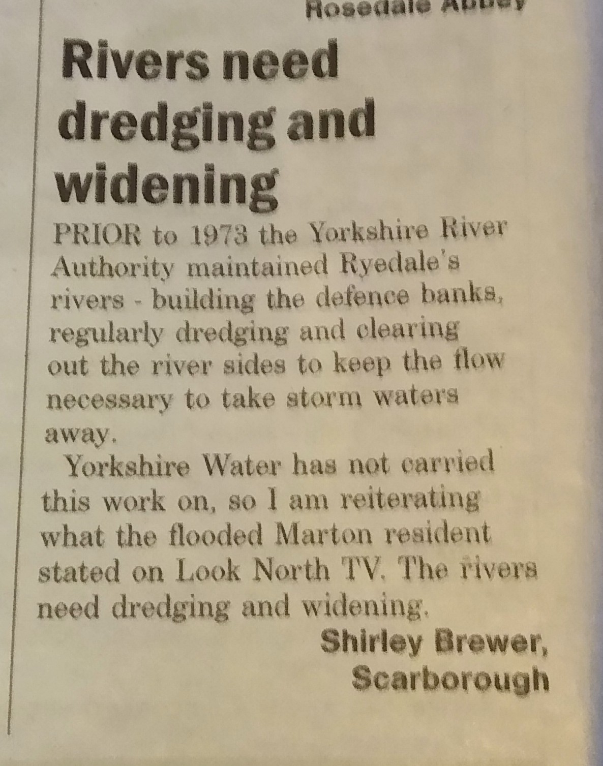 Newspaper article titled 'Rivers need dredging and widening'